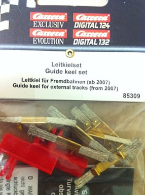 Carrera 85309 Guide keel (Red) universal with contact brushes('07 and Newer) 132/124 Scale